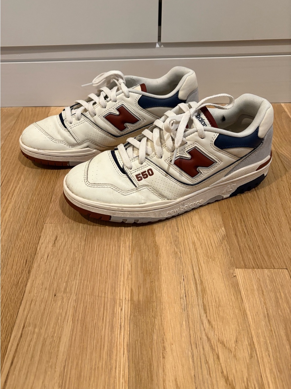 New Balance 550 Men's Sneakers in White with Red & Navy